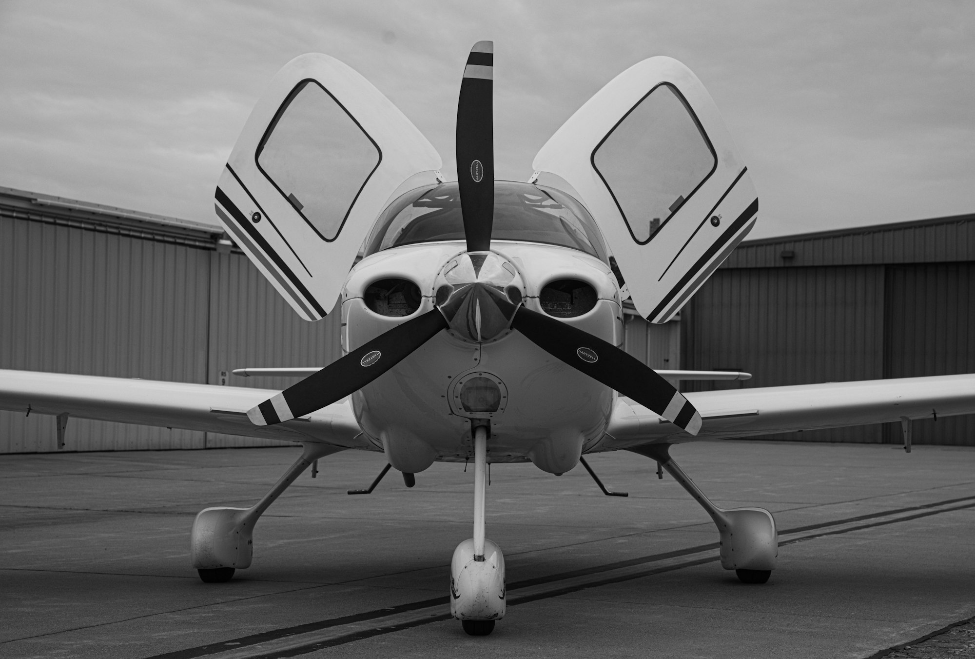Cirrus SR22 single-engine aircraft on the ramp, the type flown throughout flight training